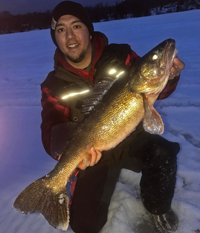 image of pete bauer with big walleye