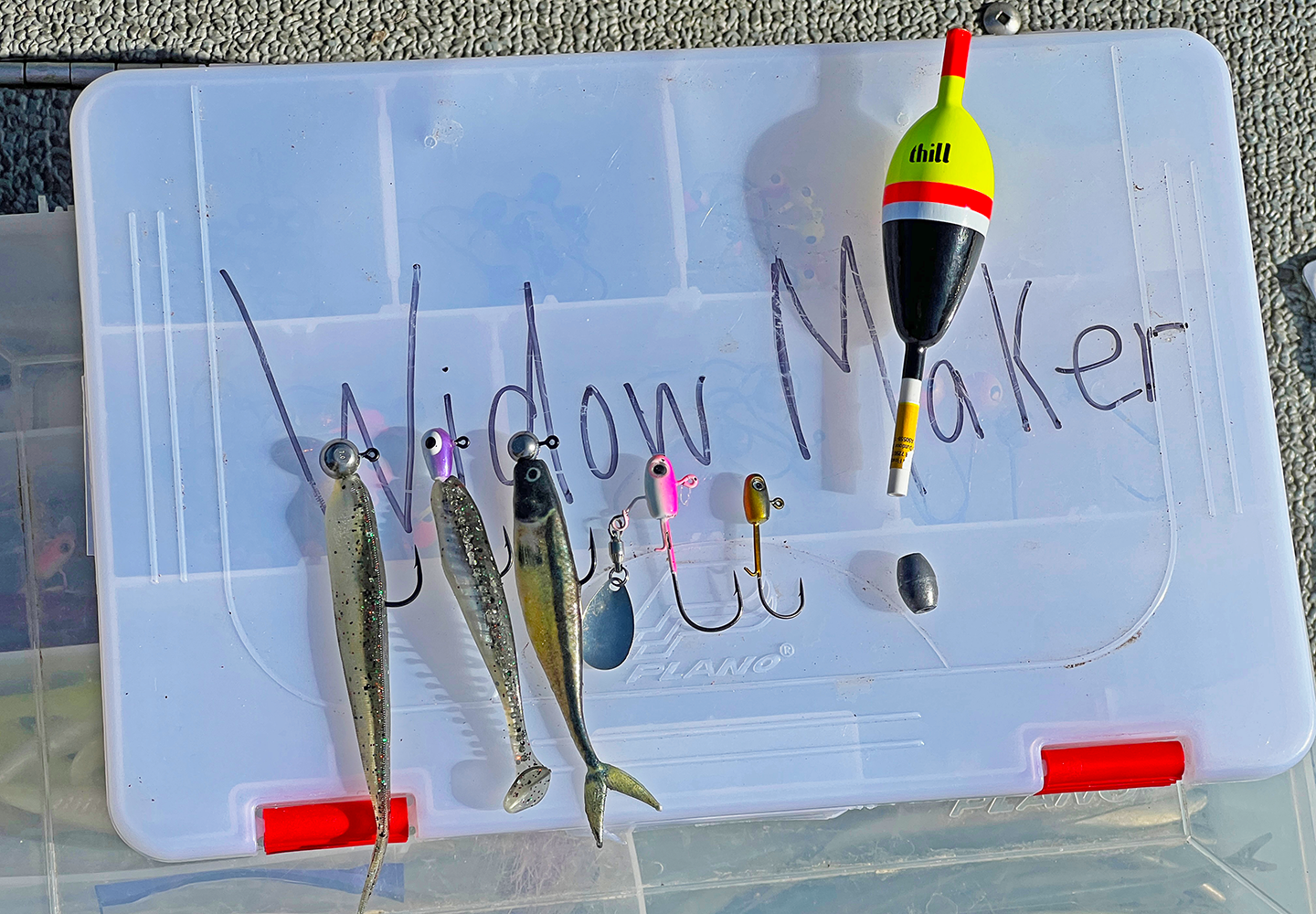 image shows selection of artificial jigging lures used bu Joe Billiar for walleye fishing