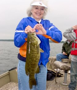 Bonnie Baird with a great Late Summer Smallmouth