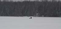 Ice Fisherman On Deer River Area Lake