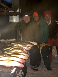 image of ice fishermen with Walleyes