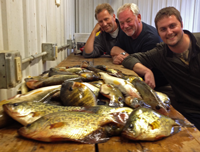 image of fishing crew with catch of the day