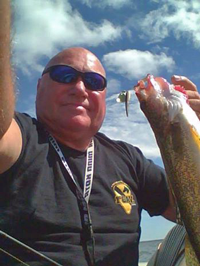 selfie image of Leroy Kramer with Walleye