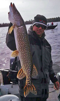 image of Reed Ylitalo holding Red Lake Pike