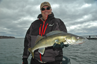 image of Mark Huelse with nice Lake Winnie Walleye