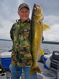 image of Kevin Goebel holding big Walleye