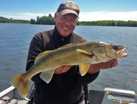 image of Jeff Sundin holding large Walleye