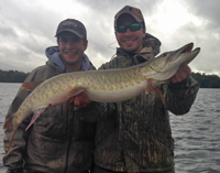 image of Grant Prokop with James after catching 2nd musky