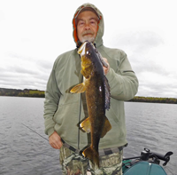 image of Bruce Clusiau with big Walleye