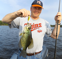 image of Joel Clusiau with big Crappie