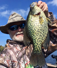 image of Greg Clusiau with giant Crappie