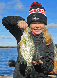 image of Claire Clusiau with giant Crappie