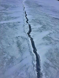 image of crack in ice at red lake