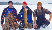 image of ice fishermen with Lake Trout