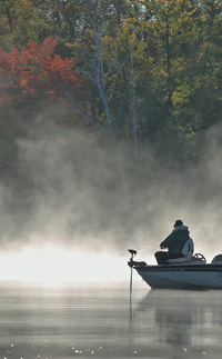 image of fisherman in steamy water
