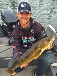 image of Justin Baily with big Walleye