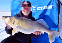 image of Greg Clusiau holding giant Lake Winnipeg Walleye
