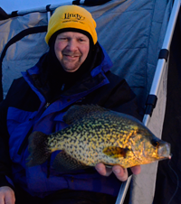 image of Jon Thelen with giant Crappie