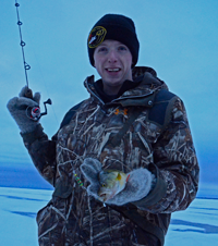 image Danny Martin holding Perch on Lake Winnie