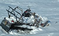 image of charred snowmobile frame