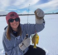 image of steph torgeson holding sunfish