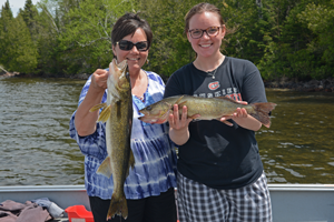 image of hippie chick and joelle with big walleyes