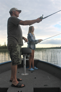 image of father daughter bass fishing 
