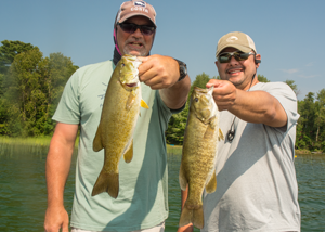 image of Jeff Minton and Brent with big Smallmouth