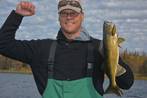 image of Mike Carlson with walleye
