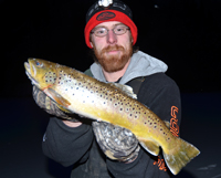 image of Nate Anderson holding Brown Trout