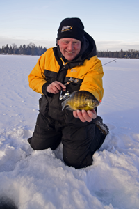 image of Jeff Sundin holding Bluegill on Bass Lake