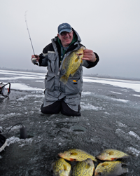 image of Arne Danielson with Crappies on the ice