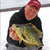 image of Jeff Sundin with Crappie on ice
