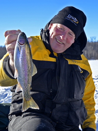 image of Jeff Sundin holding Rainbow Trout on ice