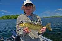 image of Mickey "Rooster" Lashley with a nice Walleye