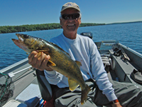 image of Bob Carlson holding nice Walleye