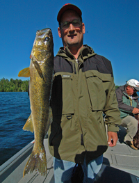 image of Al Heimer holding a big Walleye