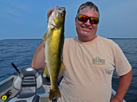image of Jeff Kuehl holding nice Walleye on Lake Winnie