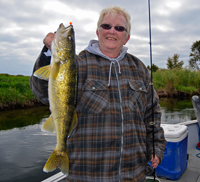 image of Karen Reynolds with nice Walleye on the Mississippi River
