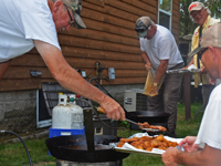 image of Jeff Skelly cooking fish
