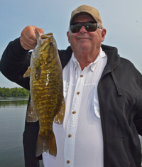 image of Jim Seeley with big Smallmouth Bass
