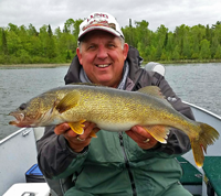 image of Keving Scott with big Walleye