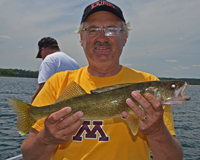 image of Tim Fischback with big Walleye