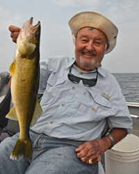 image of John Surber with big Walleye