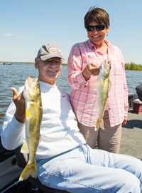 image of bob carlson and susan bolos with nice walleyes
