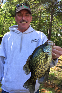 image of Tom Ryan with big Cutfoot Crappie