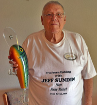 image of mike nolan with huge fishing lure