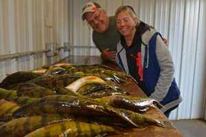 image of keith & diane eberhardt with big perch