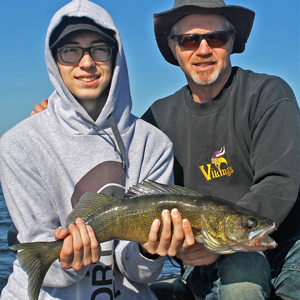 image of casey clusiau with walleye
