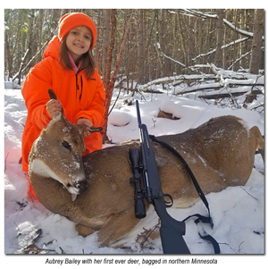 image of aubrey bailey with first deer